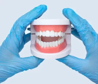 Dental Implants vs Dentures: Which Option Is Better in Lakewood?